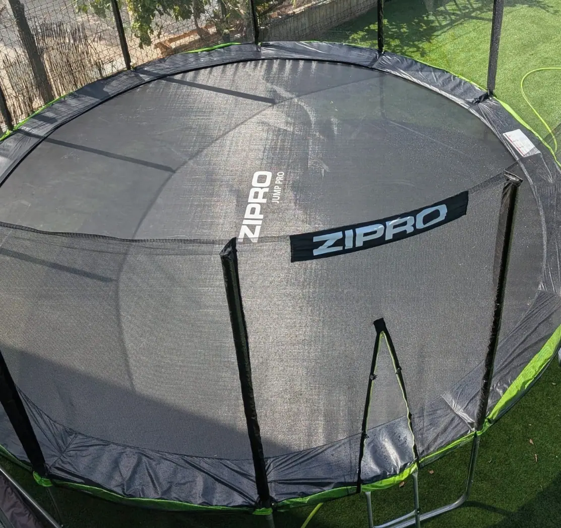 Zazoo's netted outdoor trampoline in the sunny play garden